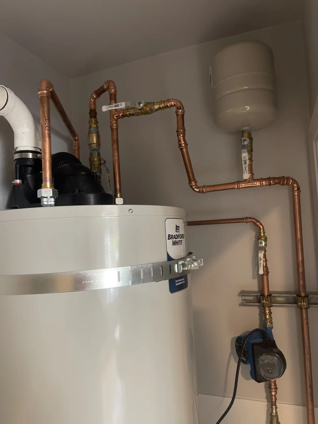 Commercial water heater installation with copper pipework